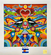 Load image into Gallery viewer, The "Lovejoy" Print by John Bukaty Artist showcases a vibrant, abstract painting featuring mirrored birds at the center, surrounded by colorful geometric patterns and shapes. A heart shape hovers above the birds, set against a mountainous landscape in the background. The words "Love" and "Joy," along with the Colorado flag, adorn the bottom of this Denver mural masterpiece.